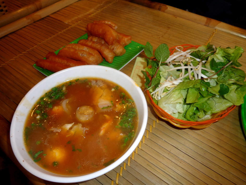 Pho served with some fried fat dough.