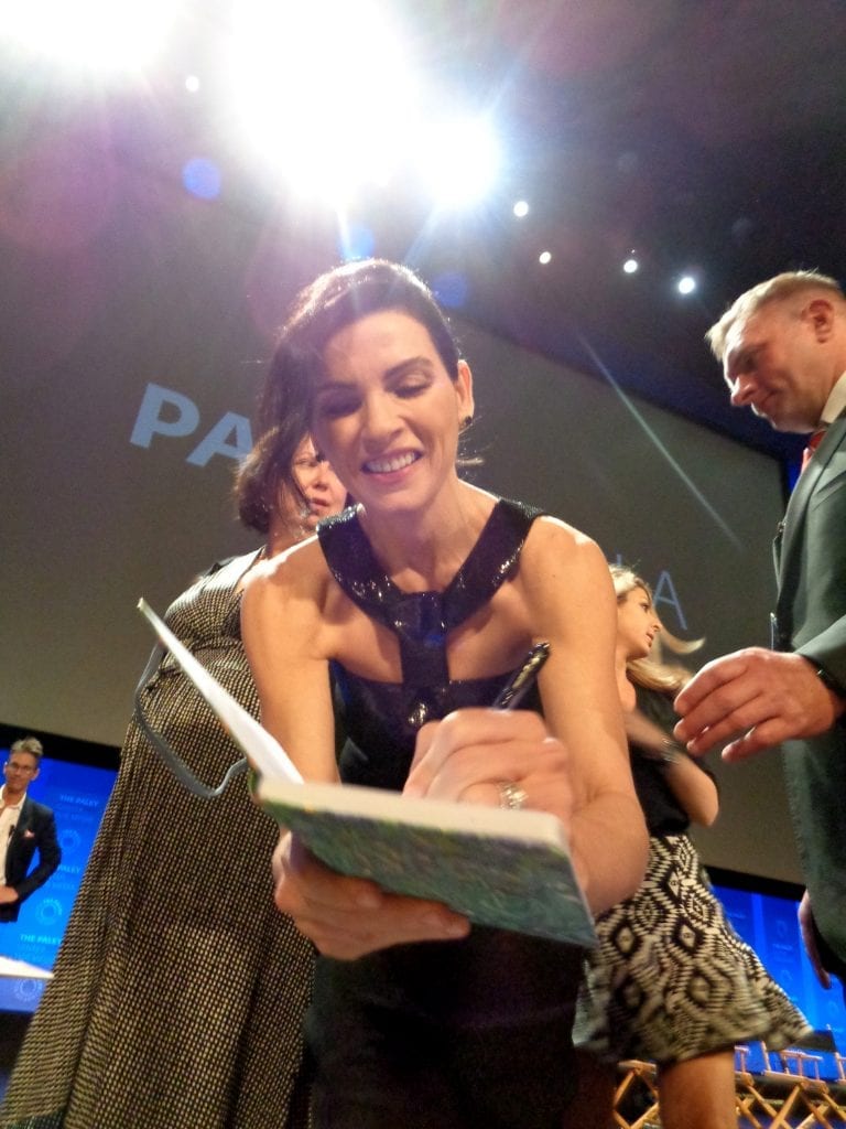 Juliana Marguiles signing my notebook