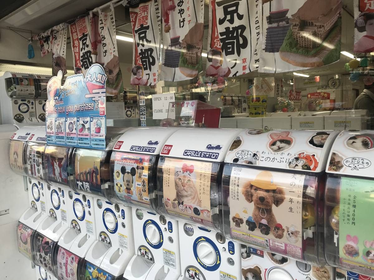 Vibrant gachapon machines filled with collectibles, a fun activity in Tokyo.