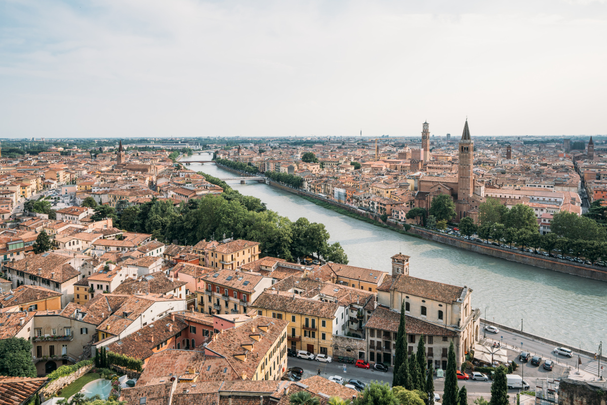 Verona Italy Aerial view of Verona with the Adige River winding through the city, showcasing top things to do like exploring the historical architecture.