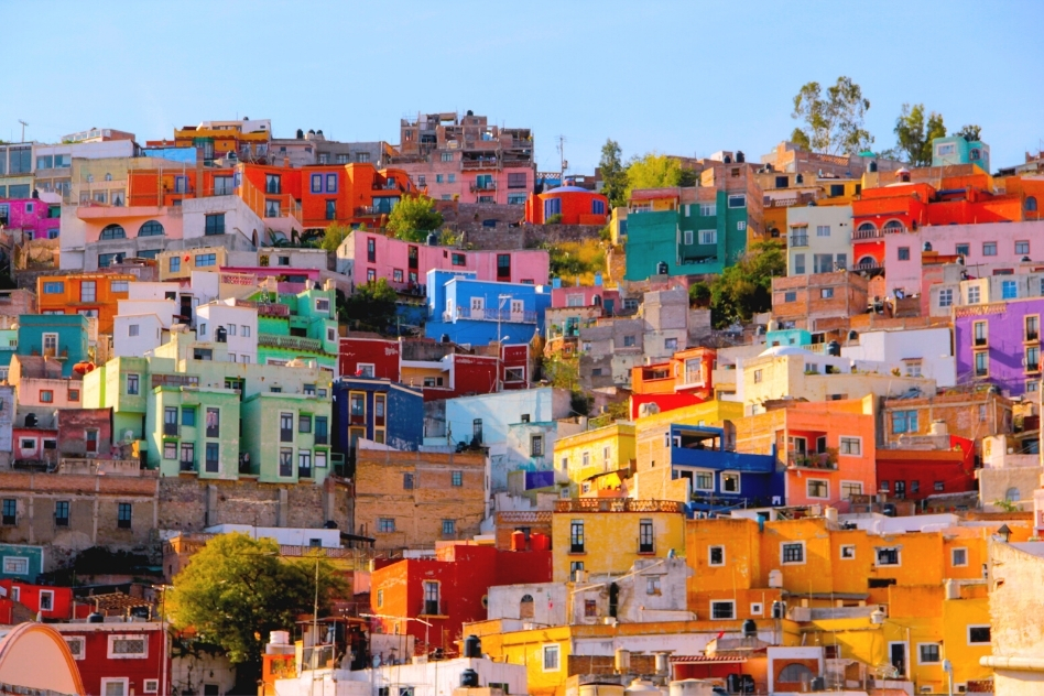 Hillside homes in a kaleidoscope of colors, each layer telling a story in one of Mexico's uniquely picturesque neighborhoods.
